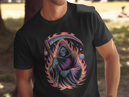 Black t-shirt with a colorful graphic of a skeleton in a robe and staff, set against a blurred outdoor background.