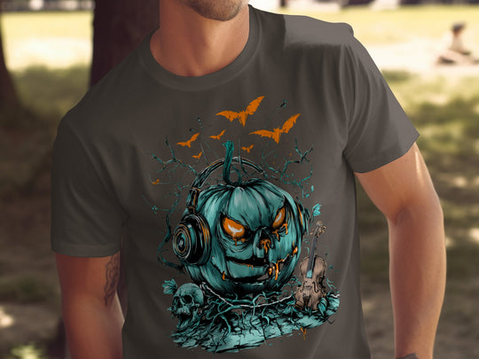 Person wearing a dark chocolate t-shirt with a teal pumpkin and headphones design outdoors.