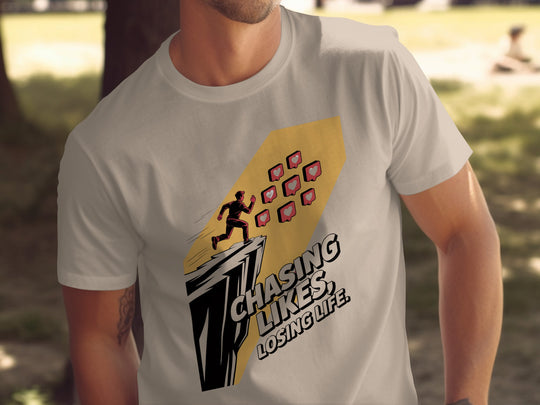 Person wearing a t-shirt with a graphic design and text outdoors