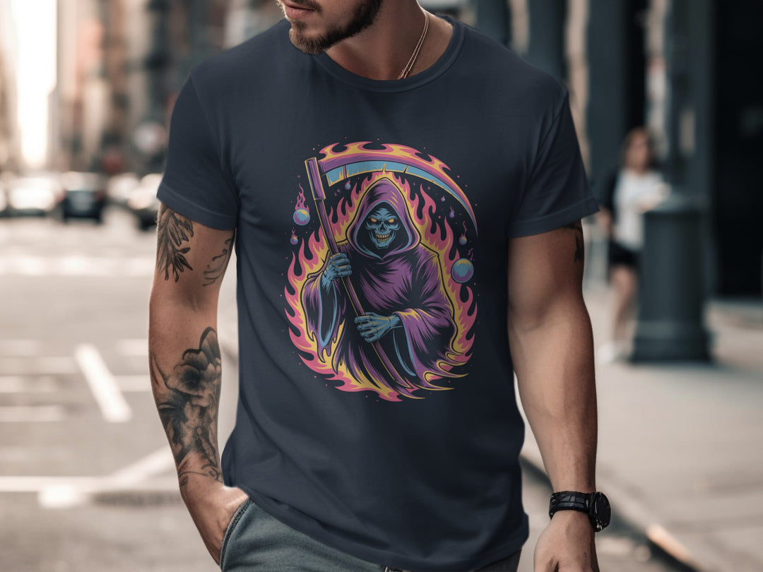 Person wearing a navy t-shirt with a colorful graphic design of a hooded figure on a city street.
