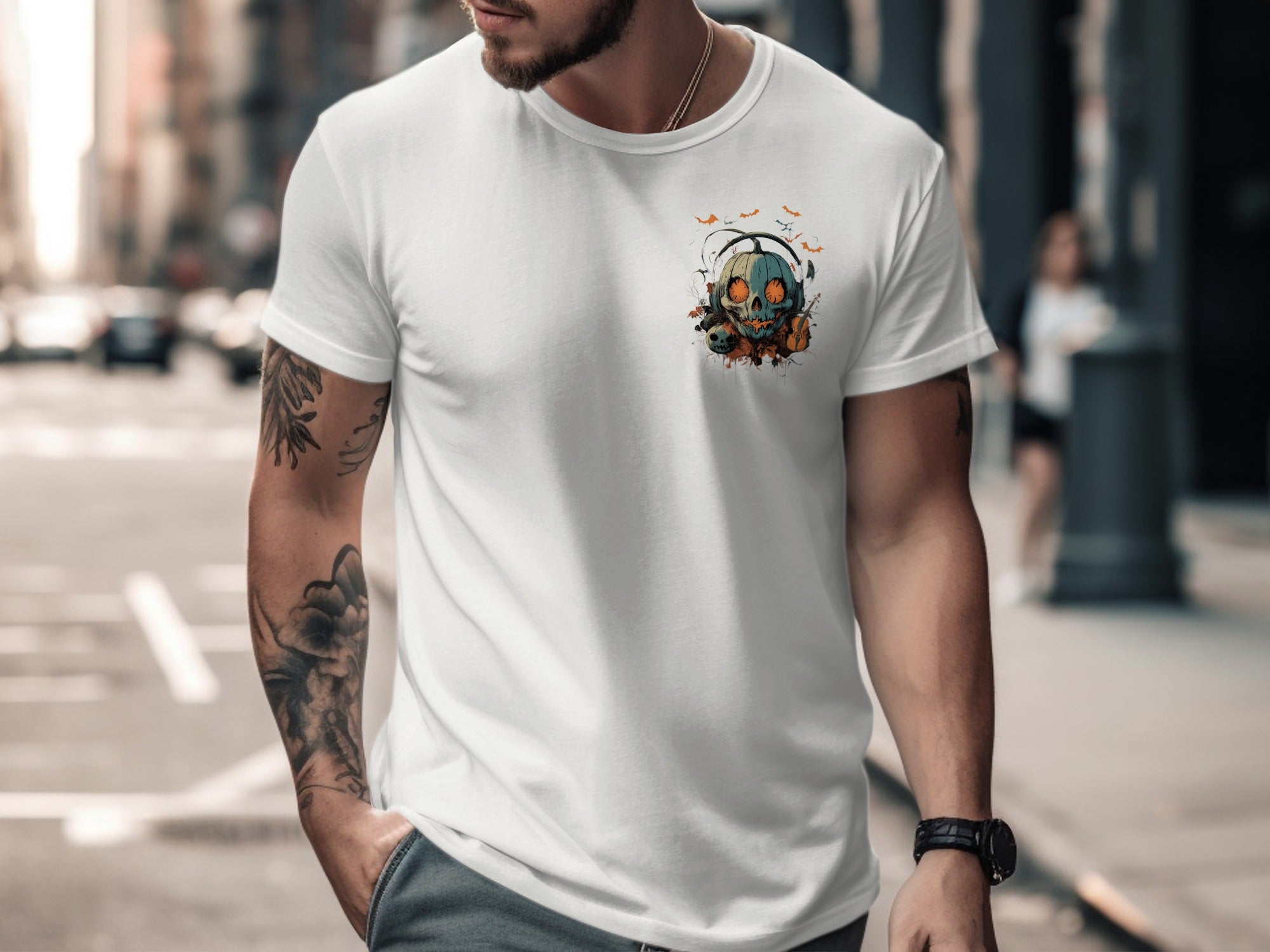 Man wearing a white t-shirt with a graphic design on a city street