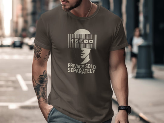 Man wearing a dark chocolate t-shirt with a graphic design and text on a city street.