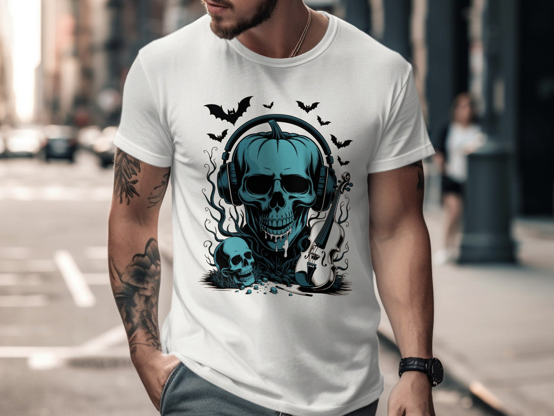 Person wearing a white t-shirt with a blue skull design on a city street.