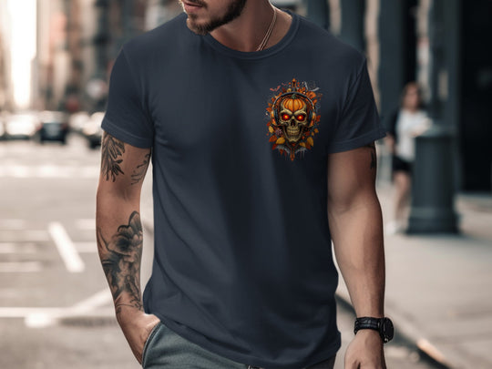 Man wearing a navy blue t-shirt with a colorful skull design on a city street.