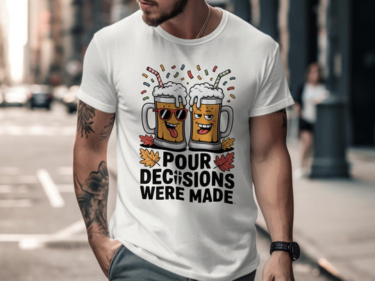 Person wearing a white t-shirt with a graphic design of two beer mugs and text on a city street.