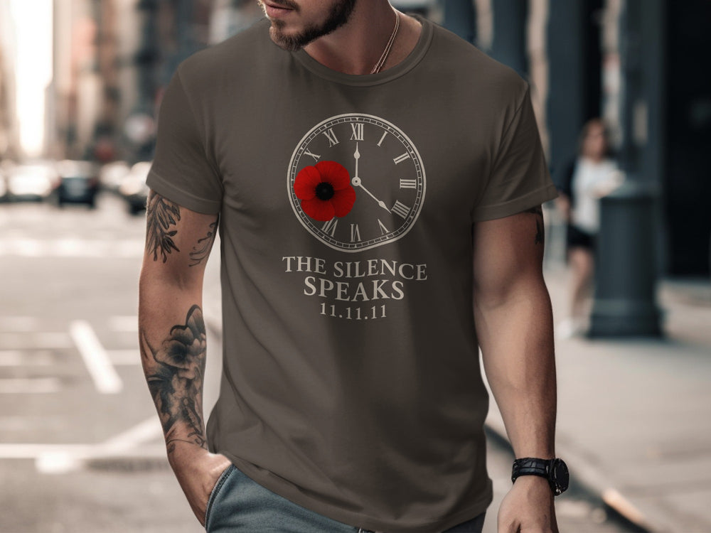 Man wearing a dark chocolate t-shirt with a clock design and text on a city street.