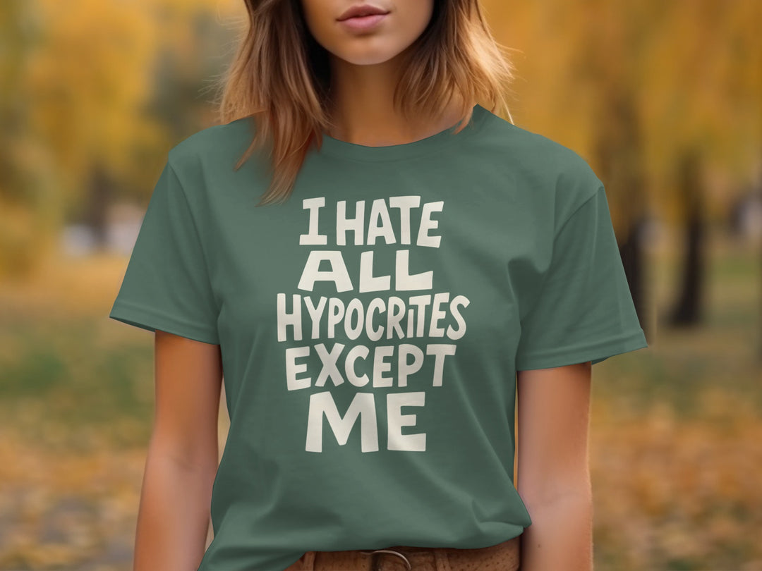 Person wearing a green t-shirt with text in an outdoor setting