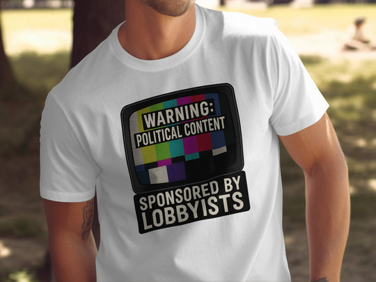 Person wearing a white t-shirt with a graphic and text about political content and lobbyists.