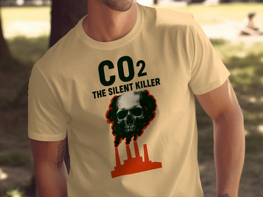 Person wearing a t-shirt with a graphic design and text 'CO2 THE SILENT KILLER' outdoors.