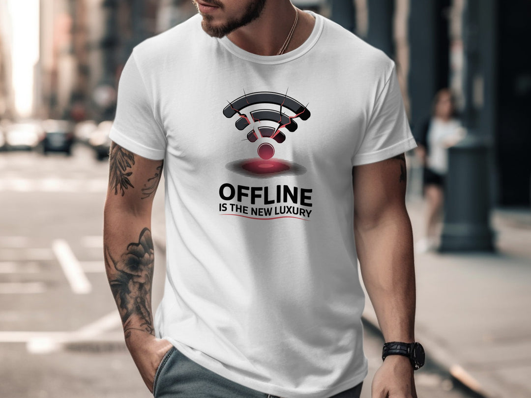 Man wearing a white t-shirt with a graphic design and text on a city street.