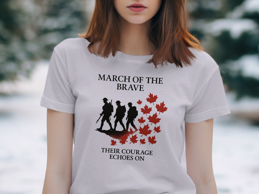 Person wearing a lavender t-shirt with a graphic design and text in a snowy outdoor setting