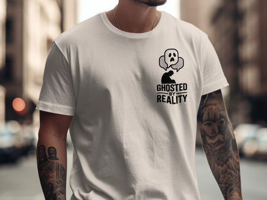 Person wearing a natural color t-shirt with a graphic design and text in an urban setting