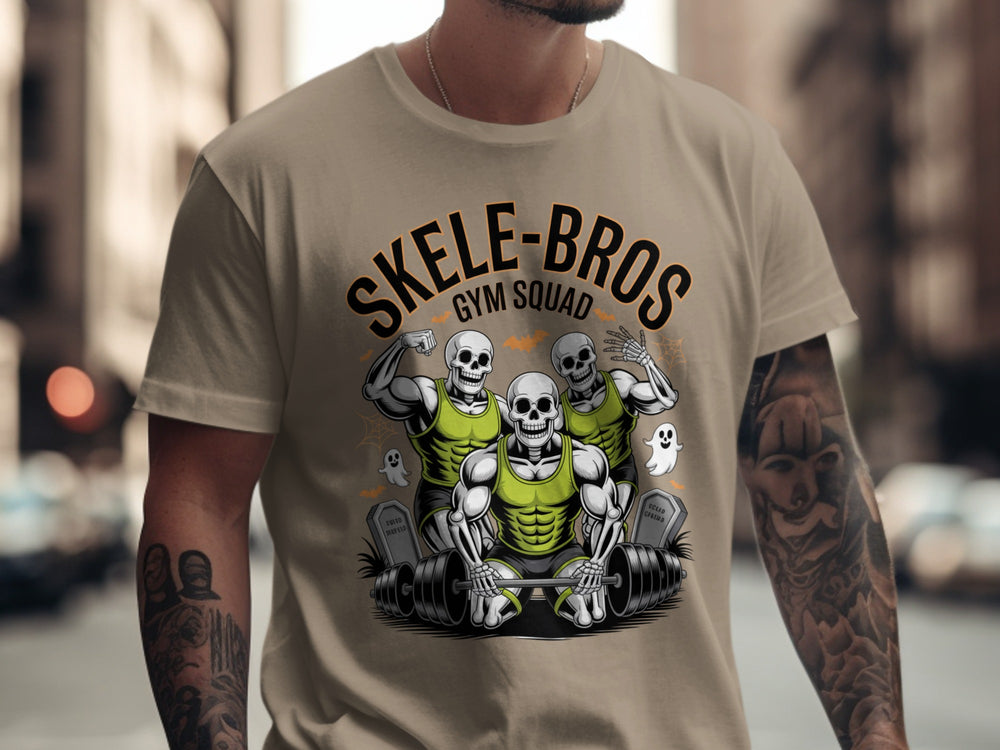 Person wearing a brown t-shirt with 'SKELE-BROS GYM SQUAD' graphic design.