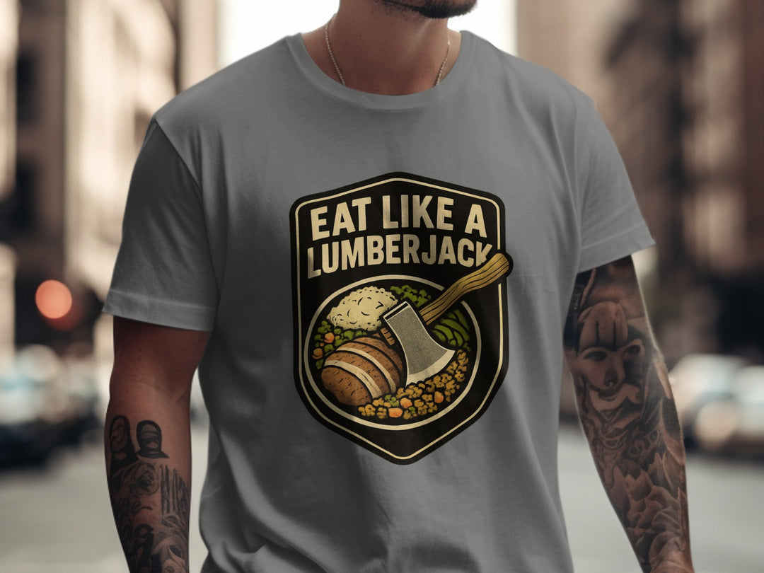 Person wearing a charcoal t-shirt with 'Eat Like a Lumberjack' graphic design.