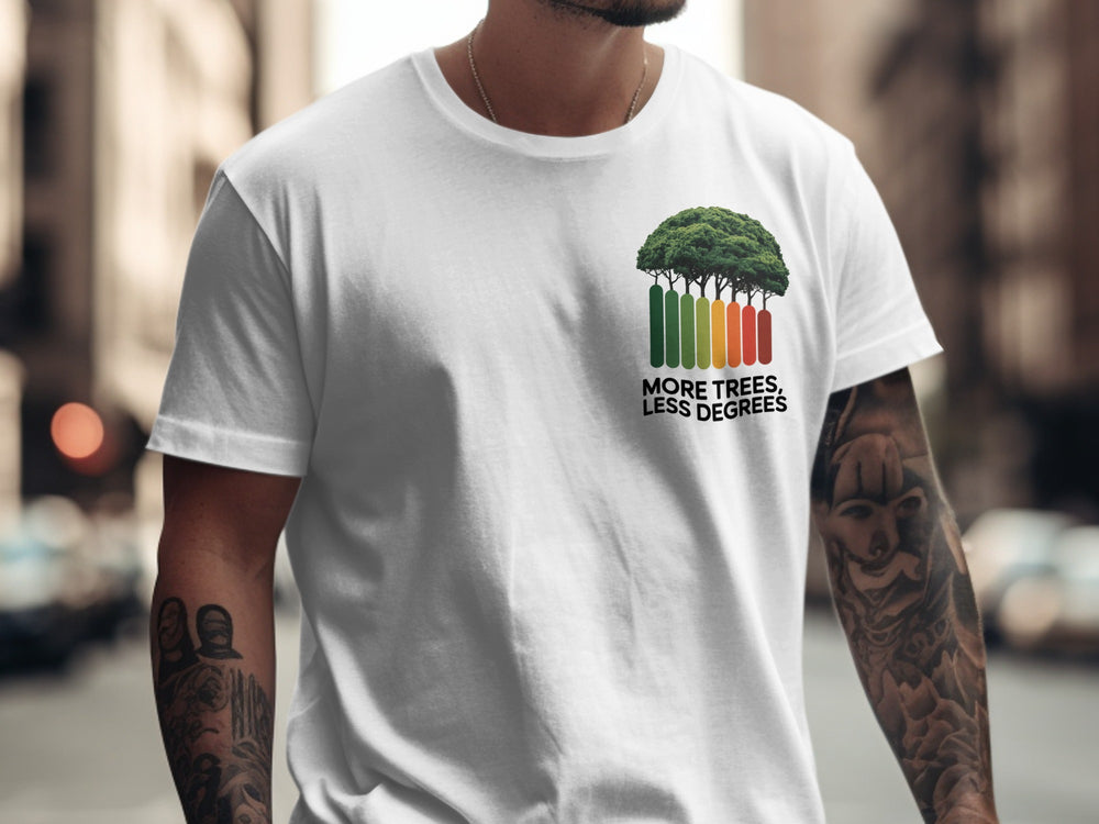 Person wearing a white t-shirt with a graphic design and text in an urban setting