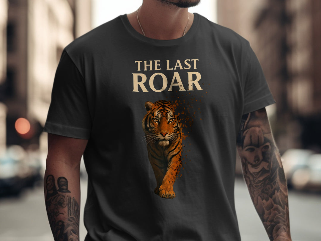 Person wearing a black t-shirt with a tiger graphic and 'The Last Roar' text on a city street.