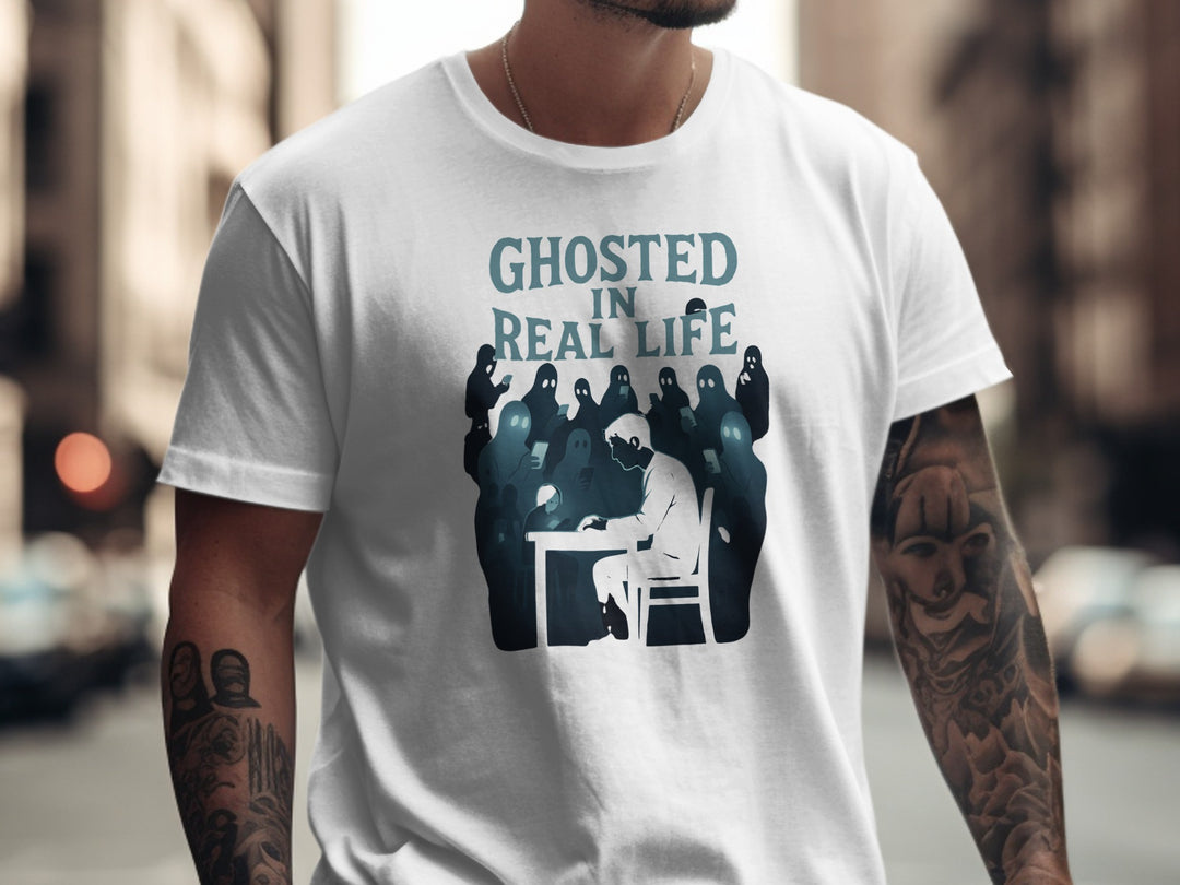 Person wearing a white t-shirt with 'Ghosted in Real Life' graphic design.