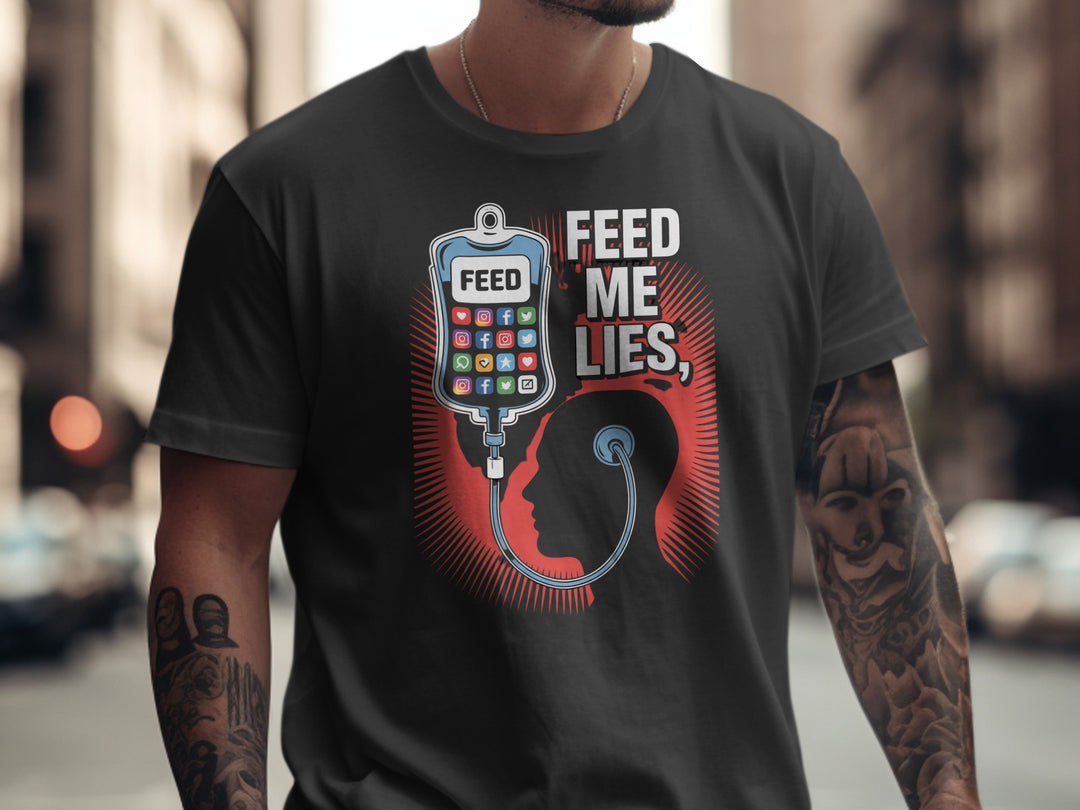 Person wearing a black t-shirt with a graphic design and text 'FEED ME LIES' in an urban setting.