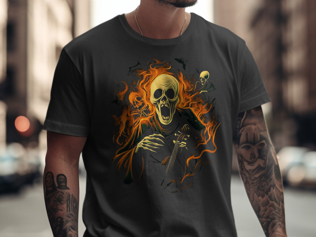 Person wearing a black t-shirt with a graphic design of a skull and flames on a city street.