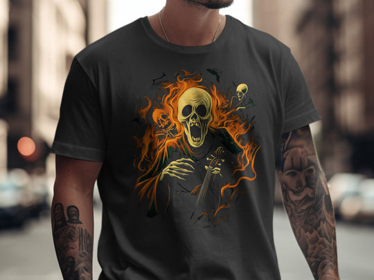 Person wearing a black t-shirt with a graphic design of a skull and flames on a city street.