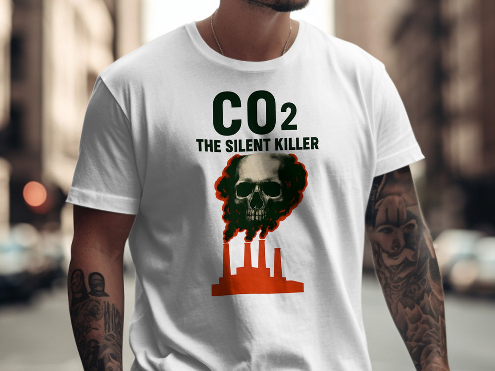 Person wearing a white t-shirt with a graphic design and text 'CO2 The Silent Killer' in an urban setting.