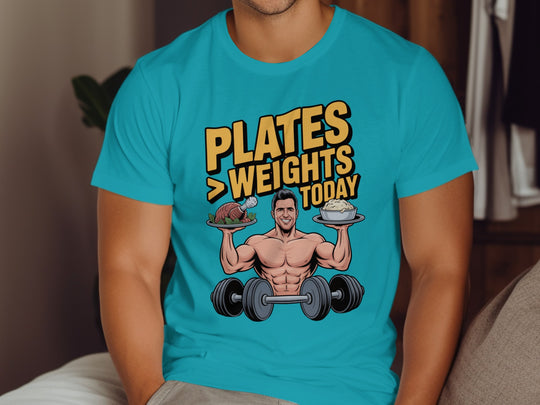 Person wearing a blue t-shirt with a graphic design and text.