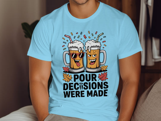 Person wearing a sky blue t-shirt with cartoon beer mugs and text.