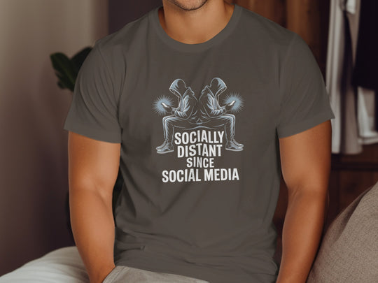 Person wearing a dark gray t-shirt with a graphic and text.