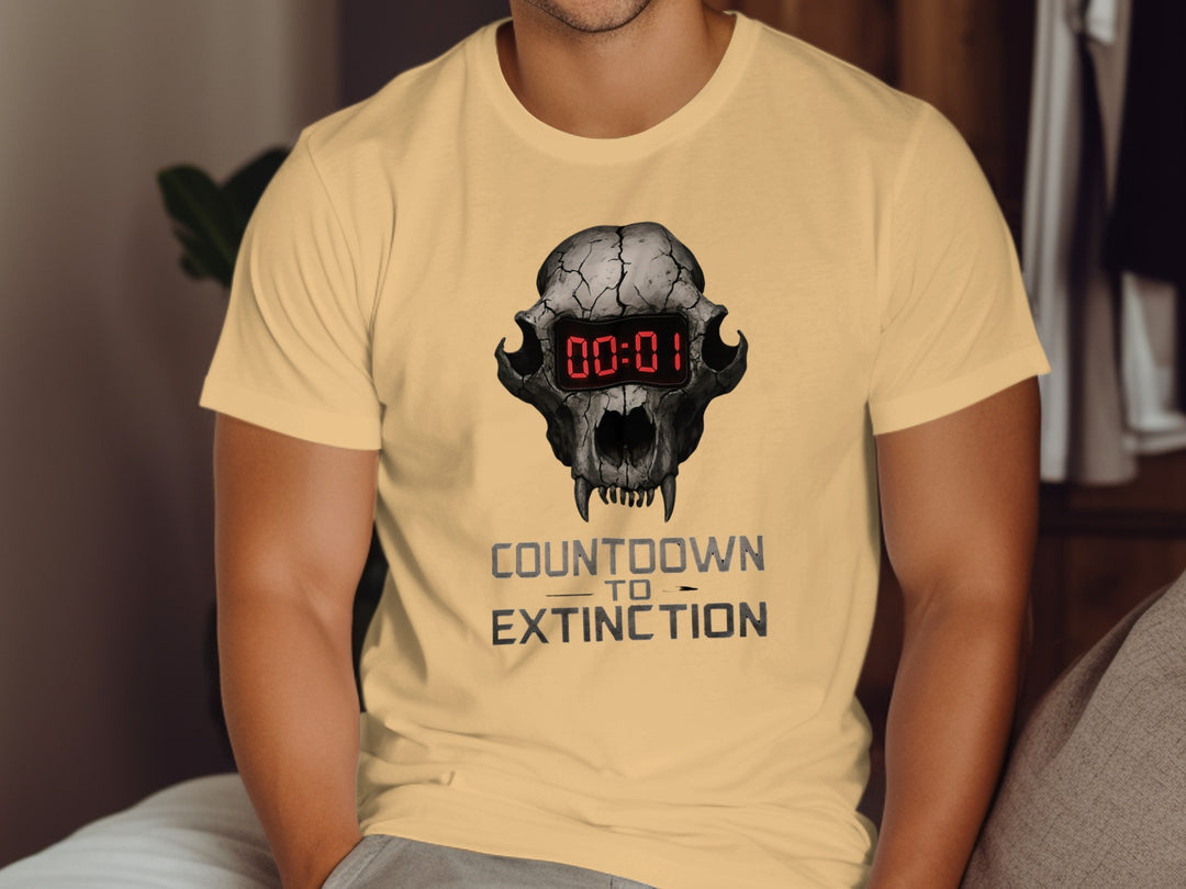 Person wearing a beige t-shirt with a graphic design of a skull with a digital clock and 'Countdown to Extinction' text.
