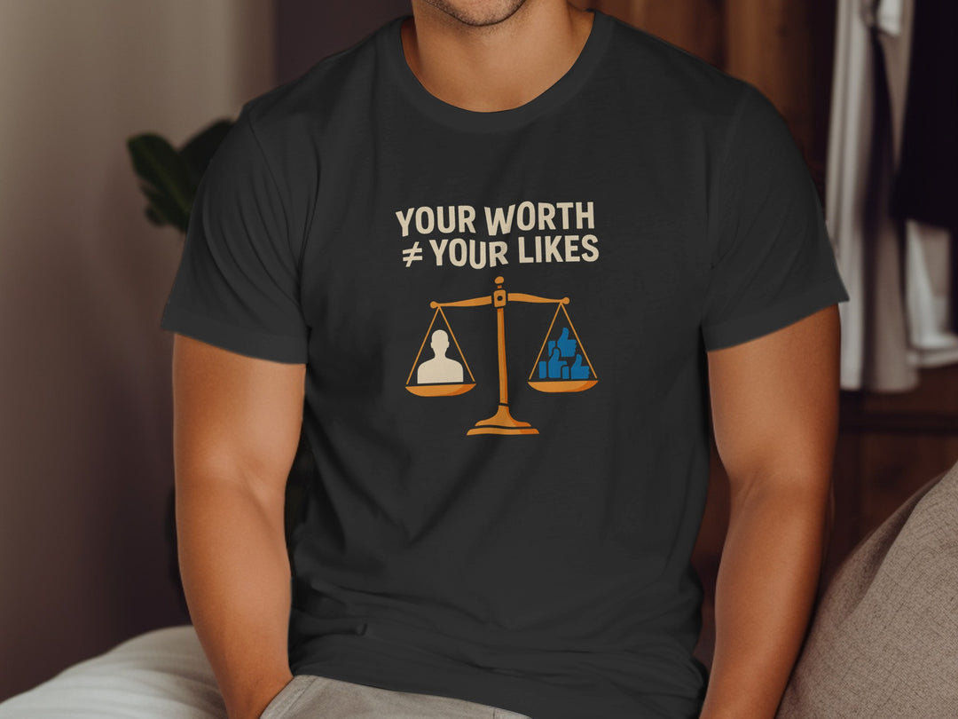 Person wearing a black t-shirt with a message about worth and likes.