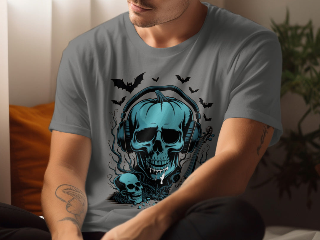 Person wearing a charcoal t-shirt with a blue skull and headphones design.