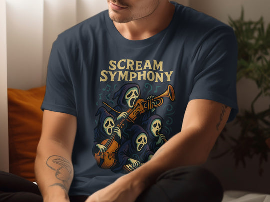 Person wearing a navy blue t-shirt with 'Scream Symphony' design featuring a ghost playing a trumpet.