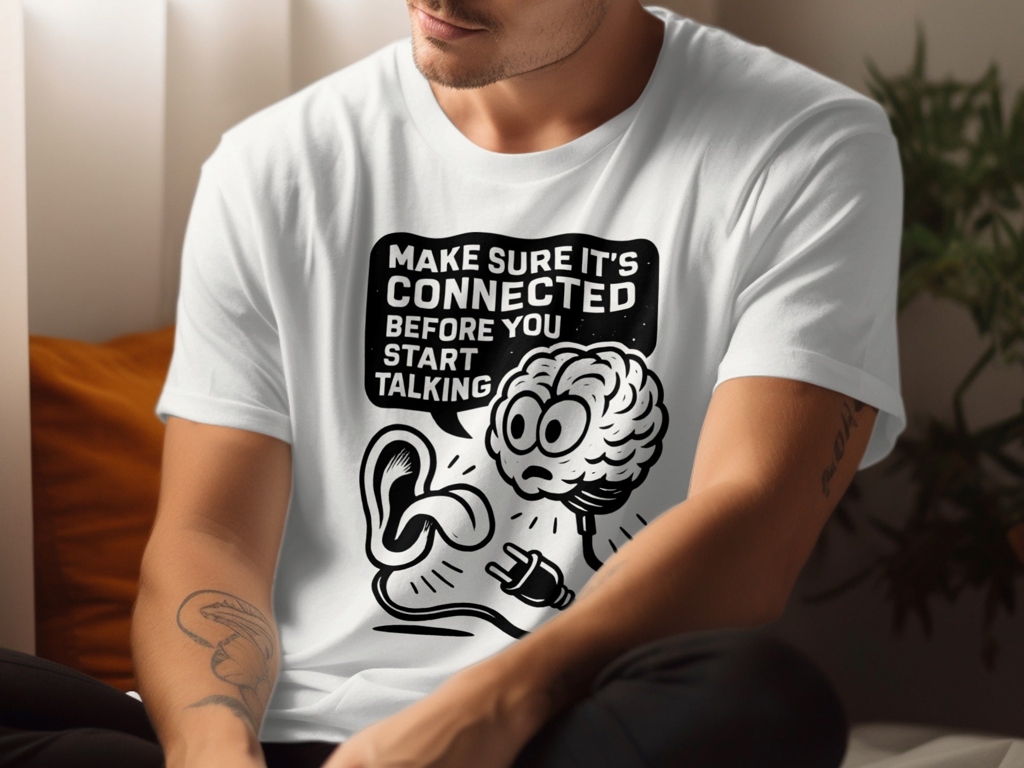 funny men's t-shirt with “make sure it’s connected before you start talking” brain plug graphic