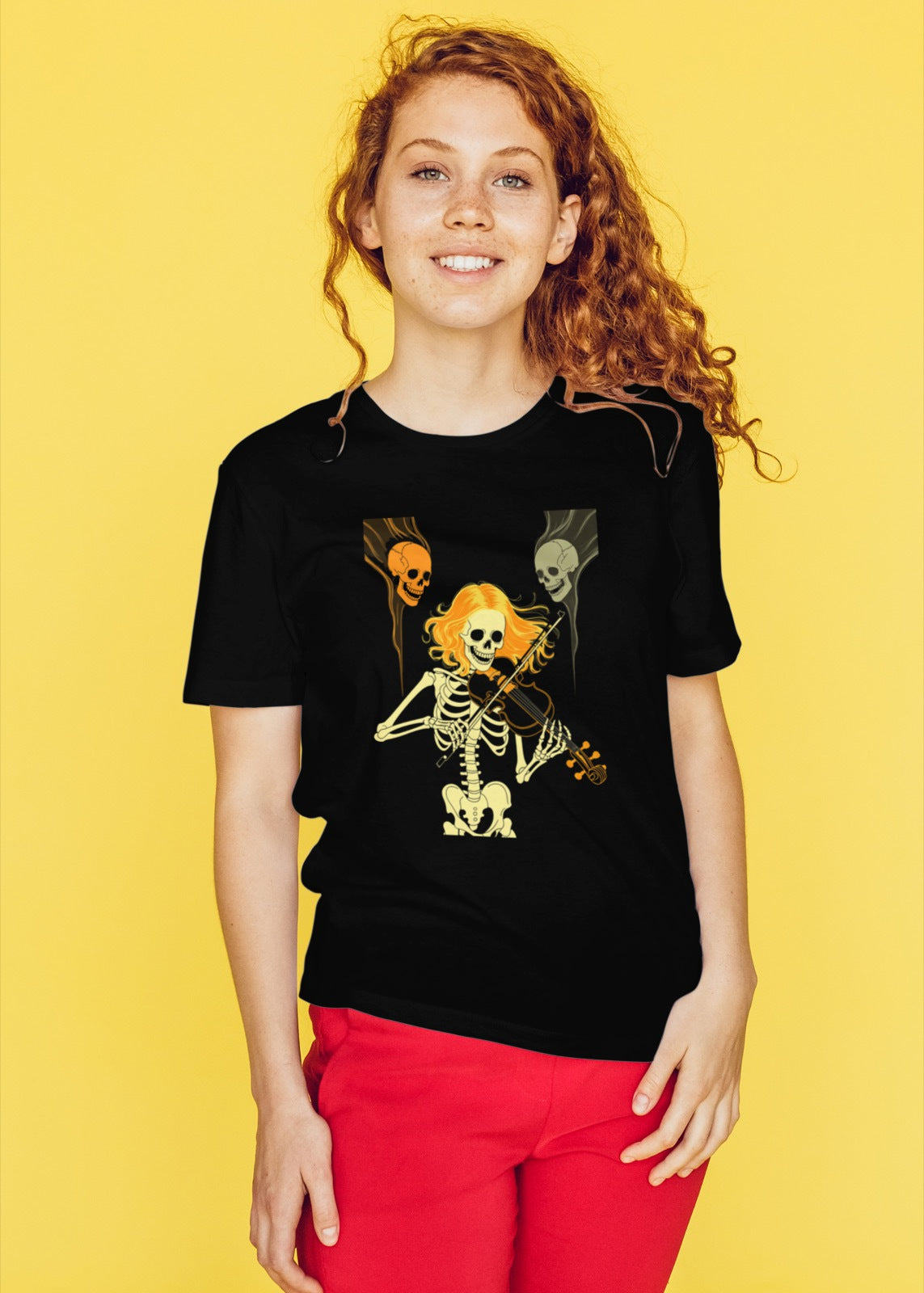 women's halloween t-shirt with ghostly violinist skeleton and floating skulls design