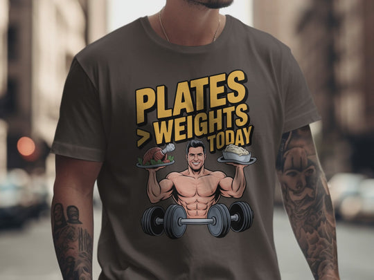 Thanksgiving men’s T-shirt with bodybuilder holding turkey and mashed potatoes; “Plates > Weights Today” text